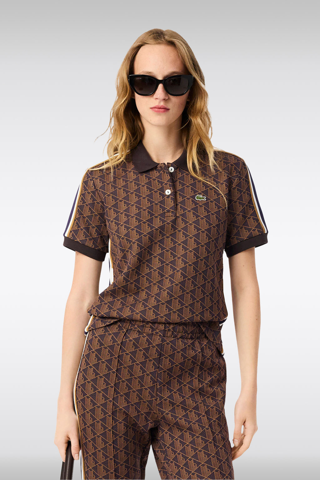 alt-image__Polo-con-motivo-jacquard-monogram-viola-e-arancione-con-maniche-corte