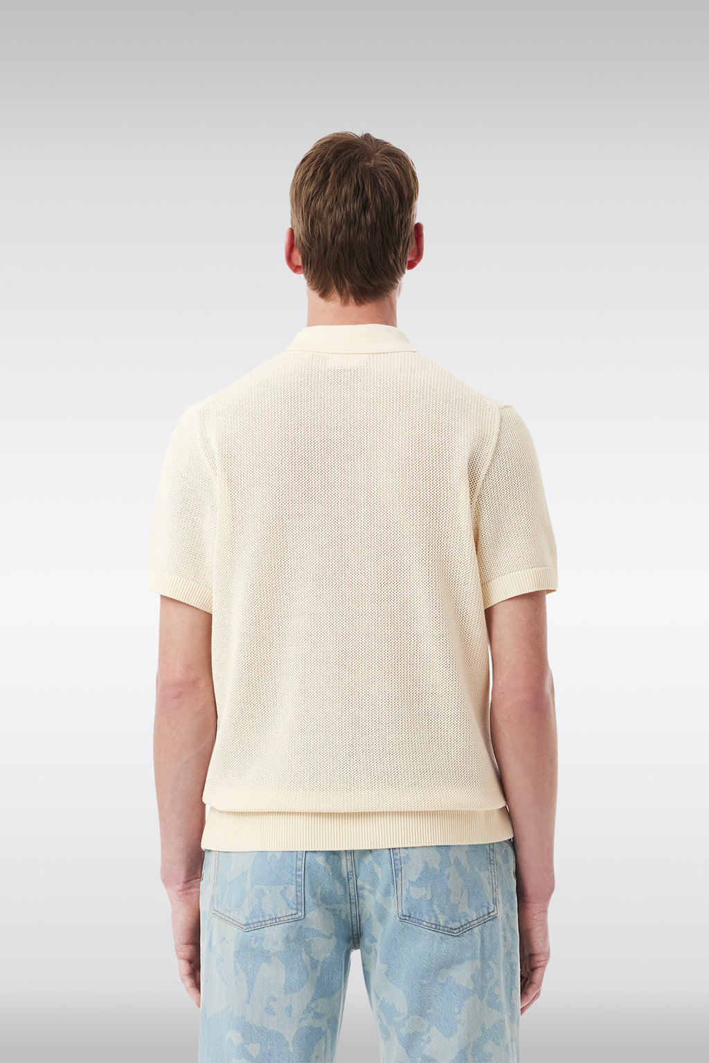 alt-image__Polo-in-maglia-di-cotone-panna-con-stemma-al-petto