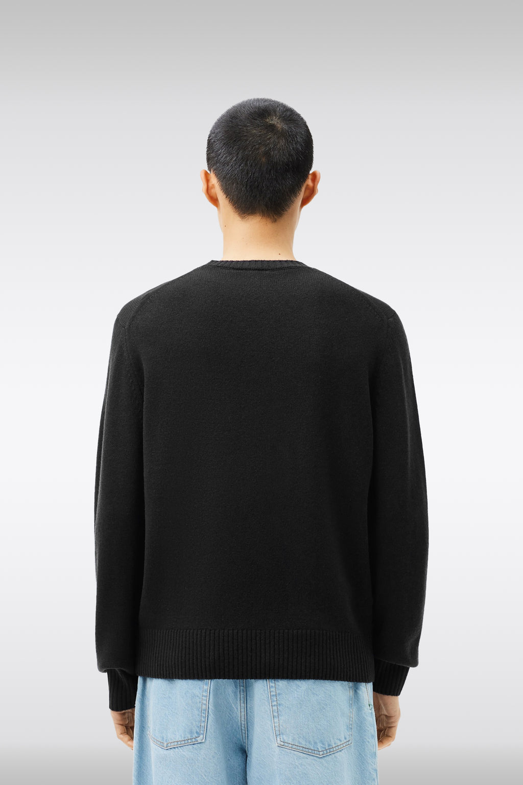 alt-image__Pullover-nero-in-lana-cardata-con-logo-al-petto