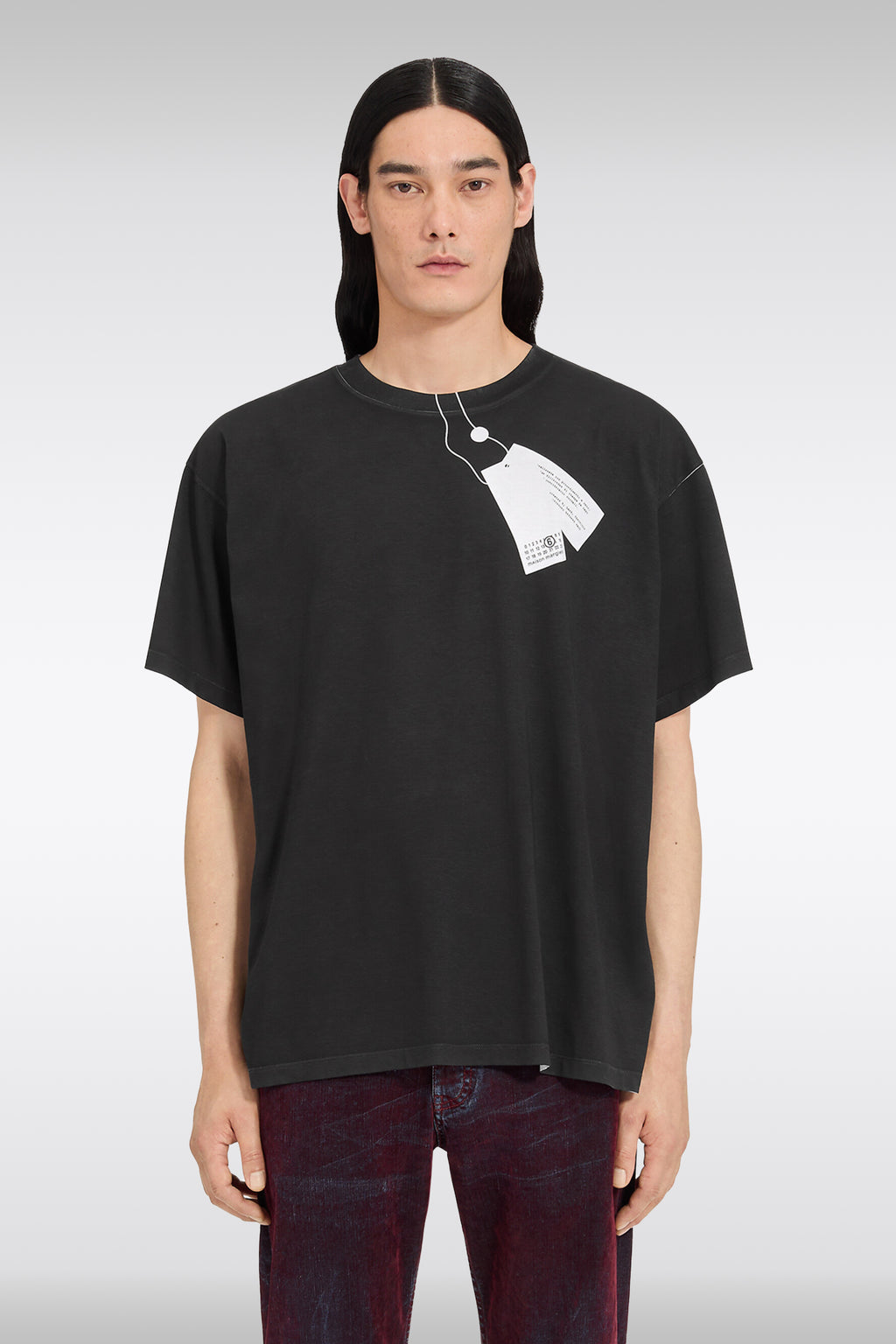 alt-image__T-shirt-nera-e-bianca-in-cotone-con-stampa-trompe-l'oeil