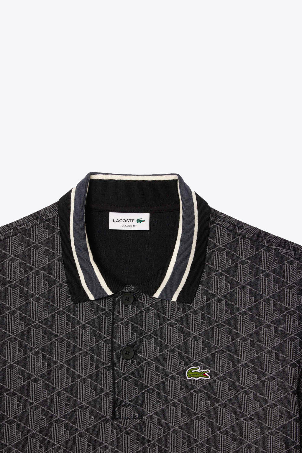 alt-image__Polo-nera-con-motivo-jacquard-monogram-con-maniche-corte