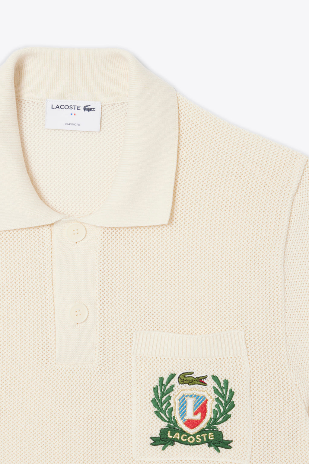 alt-image__Polo-in-maglia-di-cotone-panna-con-stemma-al-petto