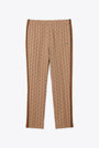 Pantalone beige con motivo jacquard monogram 