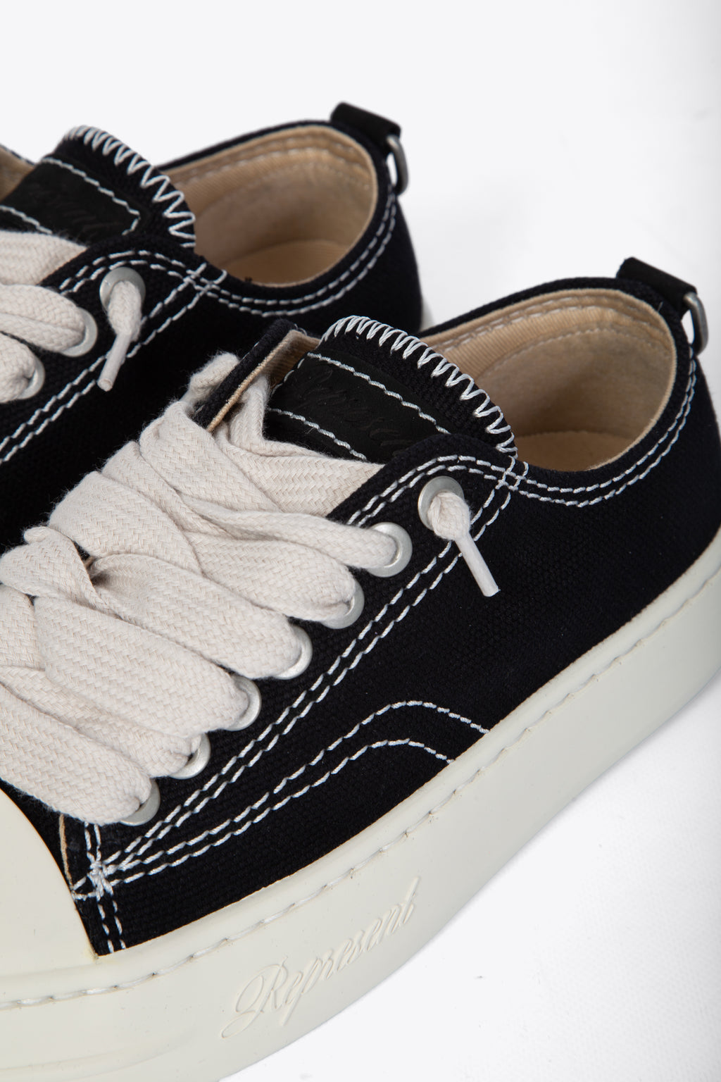 alt-image__Black-canvas-lace-up-low-sneaker-with-cap-toe---Rep-Cap
