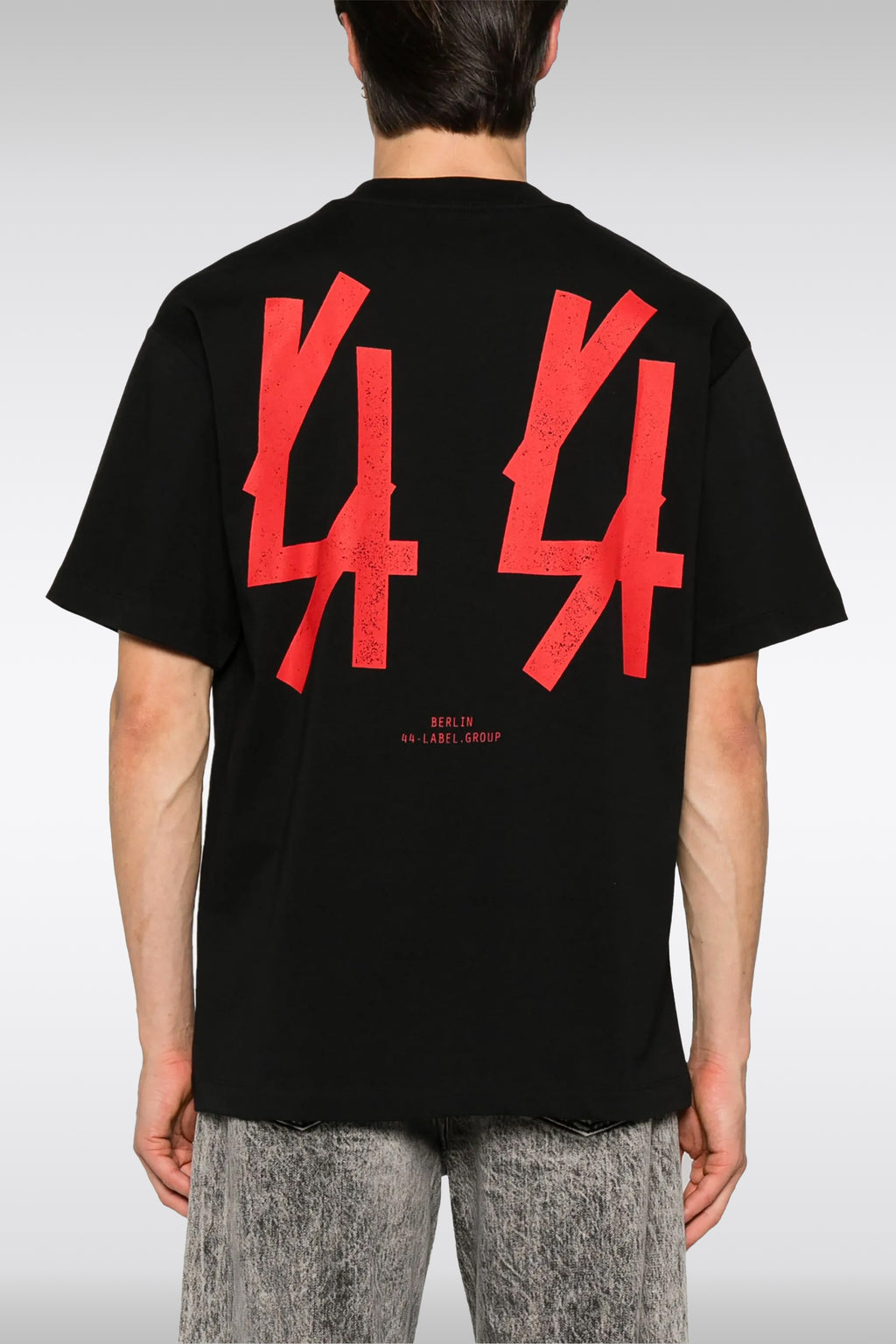 alt-image__T-shirt-nera-in-cotone-con-stampa-frontale-e-logo-sul-retro-in-rosso---Guestlist-Tee
