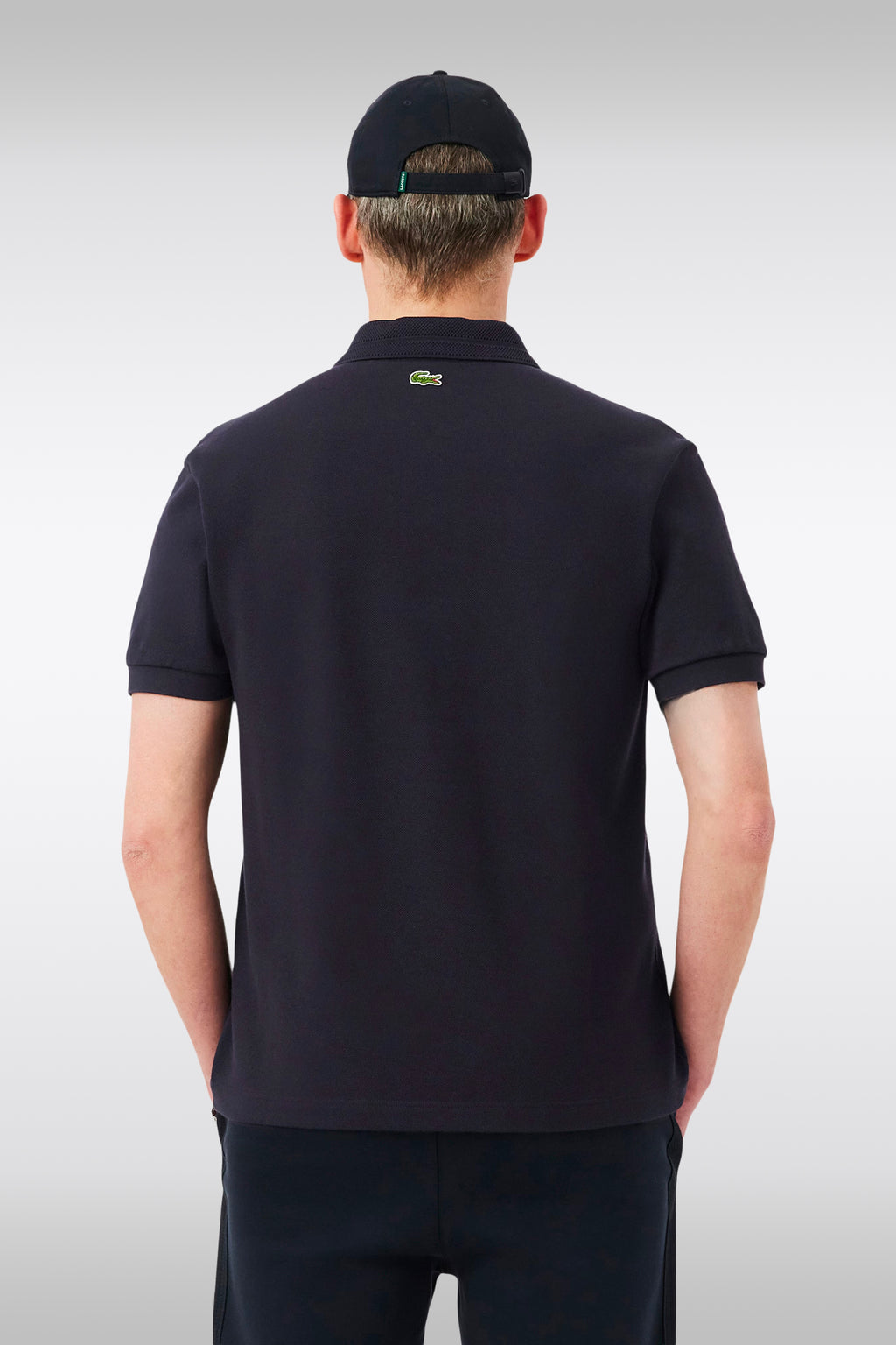 alt-image__Polo-nera-in-cotone-con-colletto-ricamato-e-logo-a-rombo-al-petto