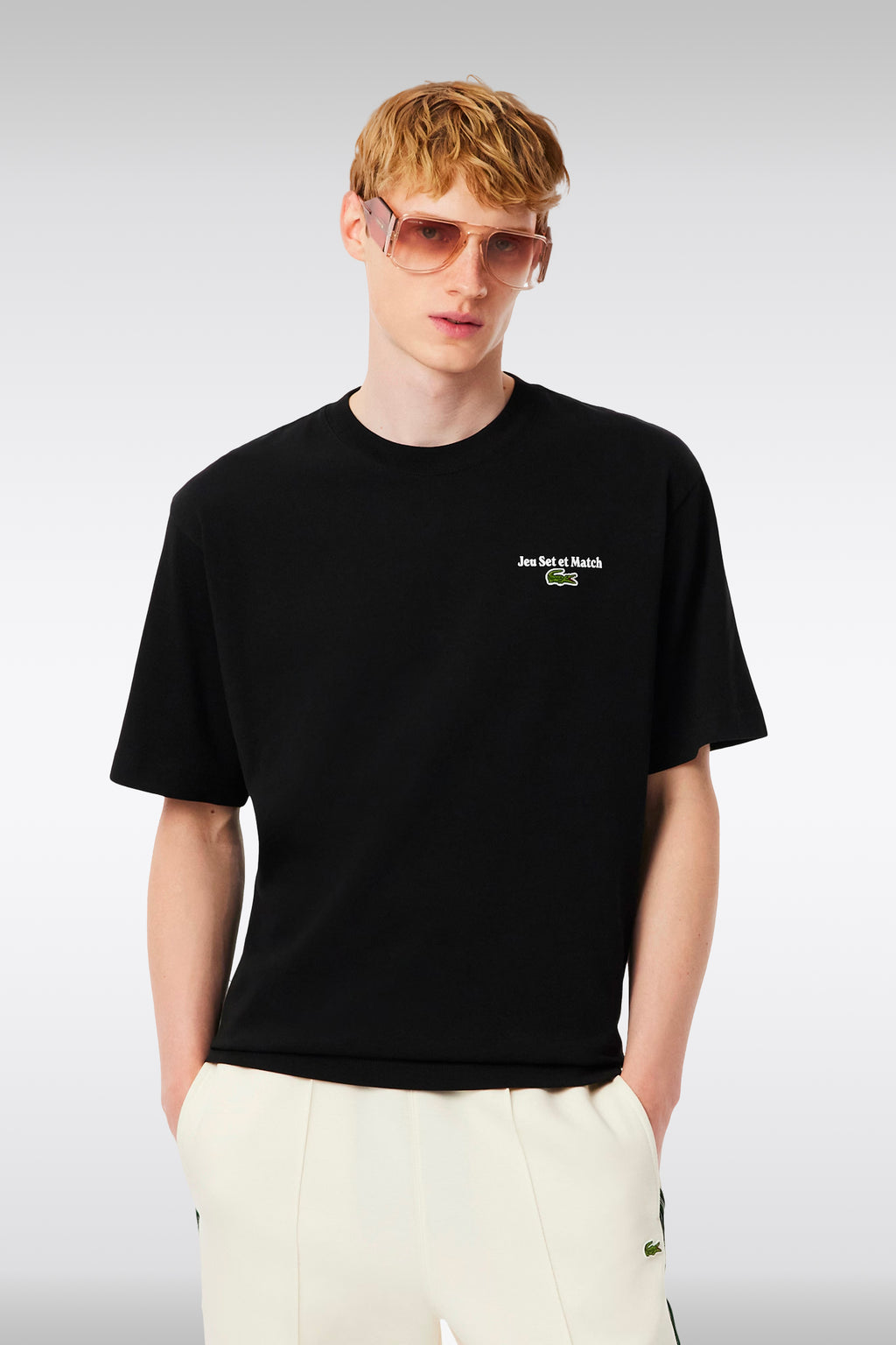 alt-image__T-shirt-nera-in-cotone-con-slogan-al-petto-e-sul-retro