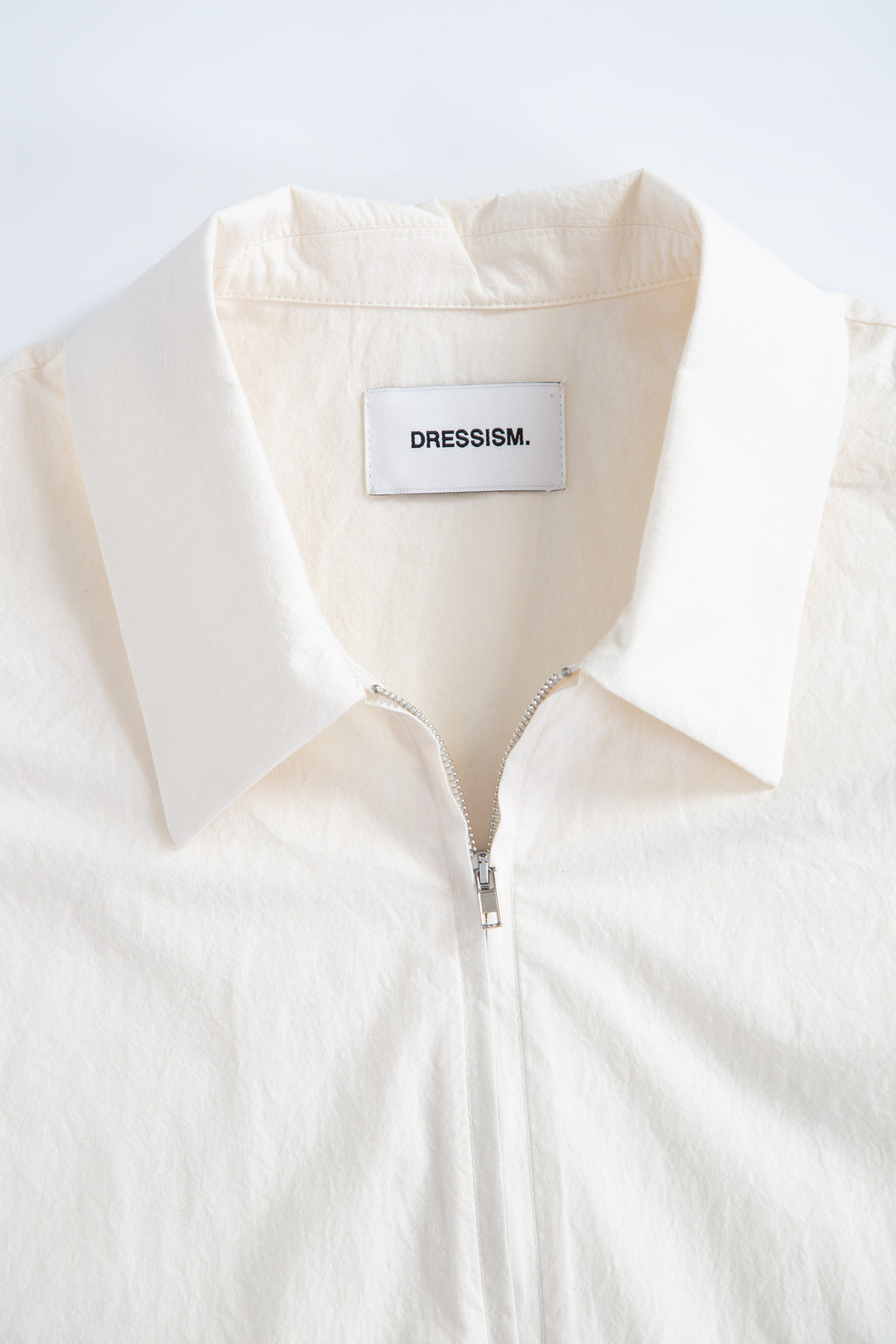 alt-image__Camicia-in-popeline-panna-con-zip-e-maniche-corte