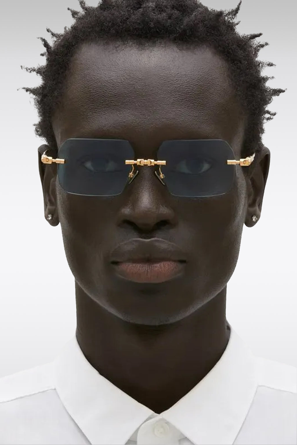 alt-image__Occhiali-da-sole-rimless-con-lenti-azzurre---H68