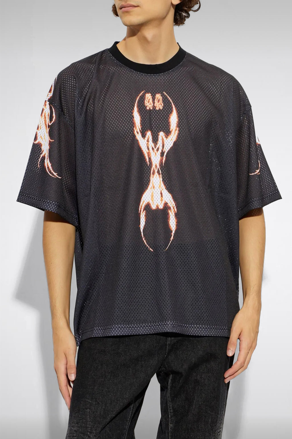 alt-image__T-shirt-nera-in-mesh-con-logo-e-stampa-fiamme---Y2K-World-Fire-Soccer-Tee
