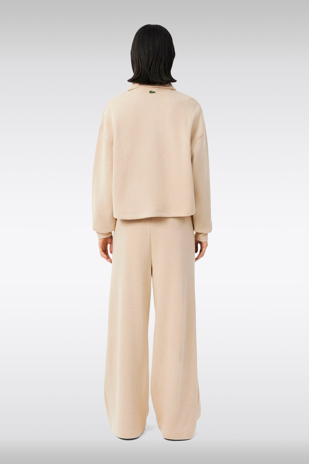 alt-image__Pantalone-in-maglia-a-coste-beige-baggy-con-pince-frontale