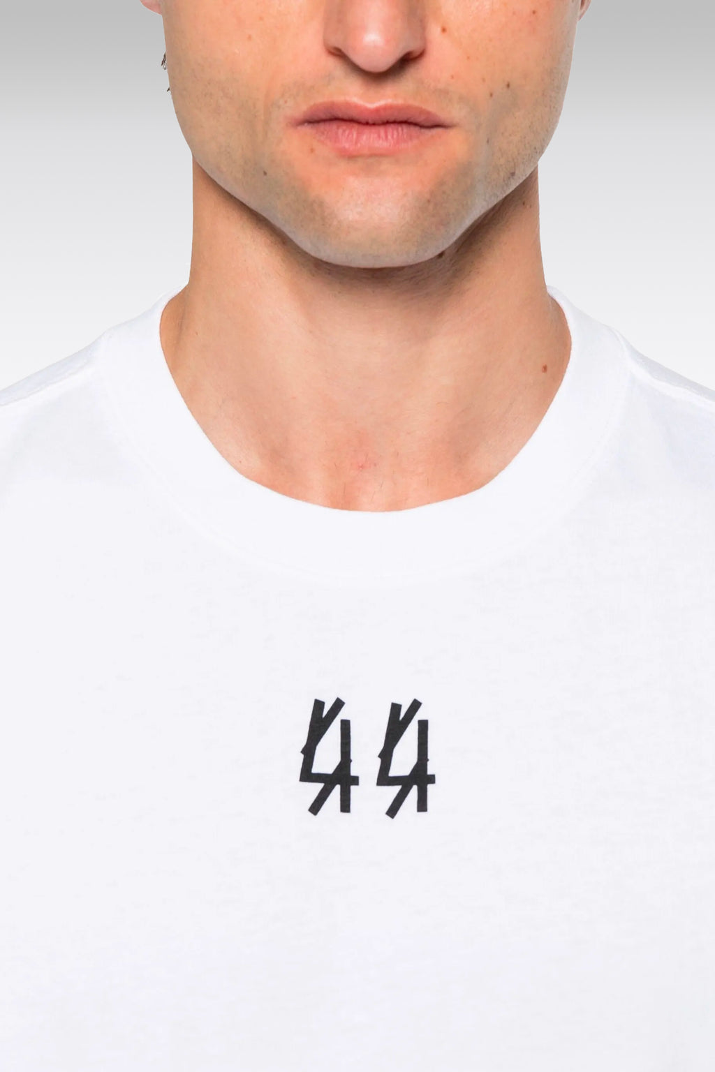 alt-image__T-shirt-bianca-in-cotone-con-logo-al-petto-e-sul-retro---Classic-Tee