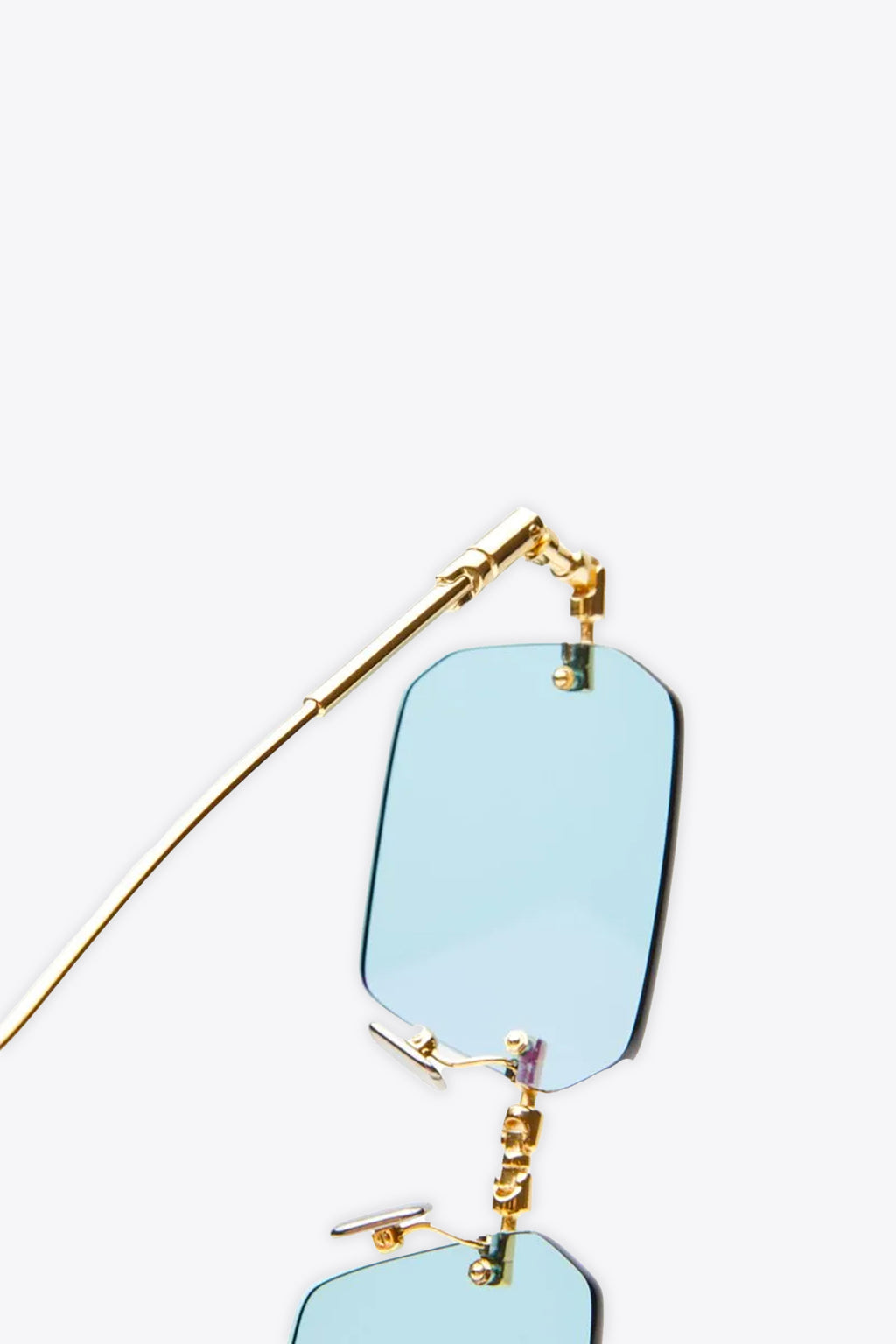 alt-image__Occhiali-da-sole-rimless-con-lenti-azzurre---H68