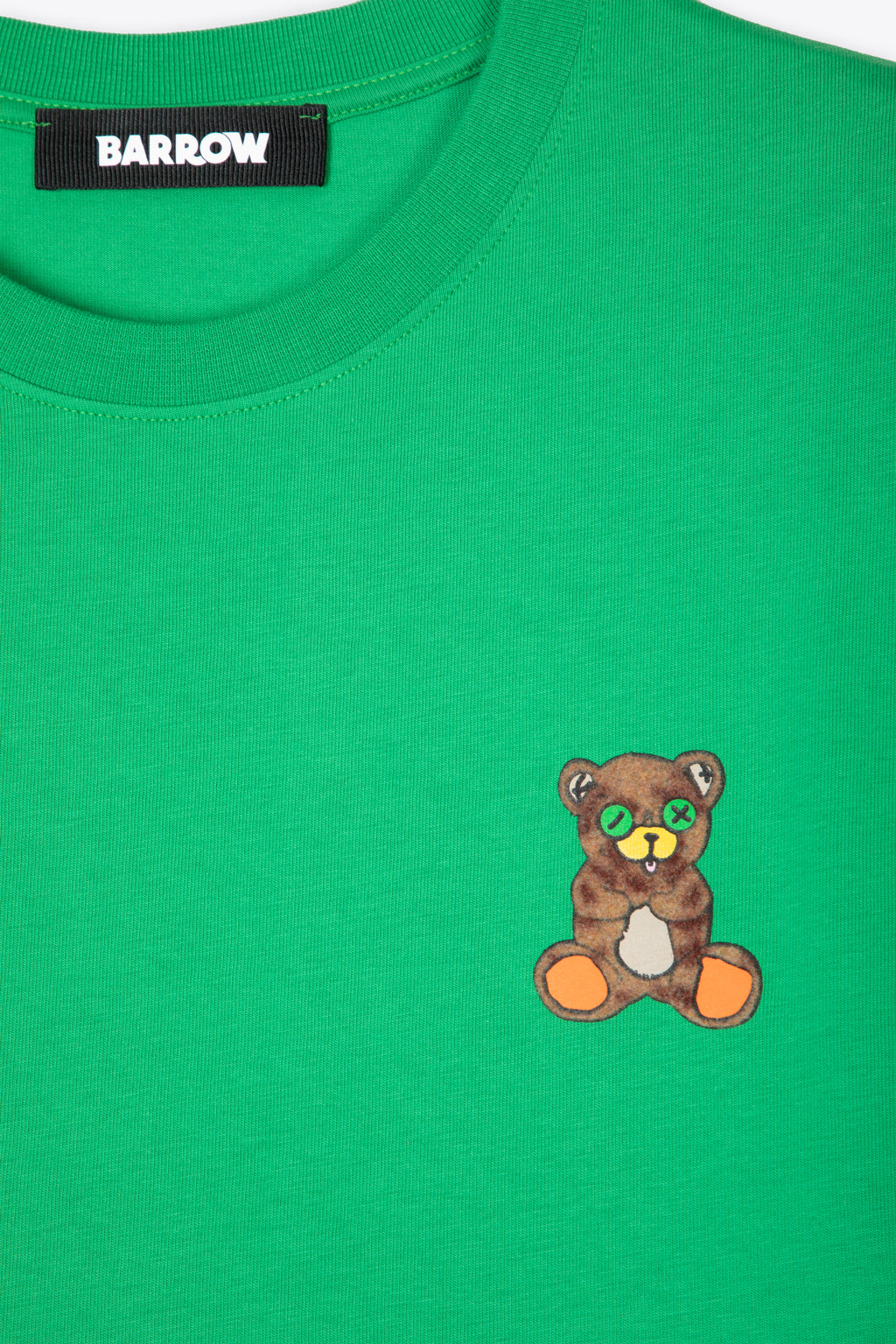 alt-image__T-shirt-verde-con-teddy-bear-al-petto-e-slogan-sul-retro