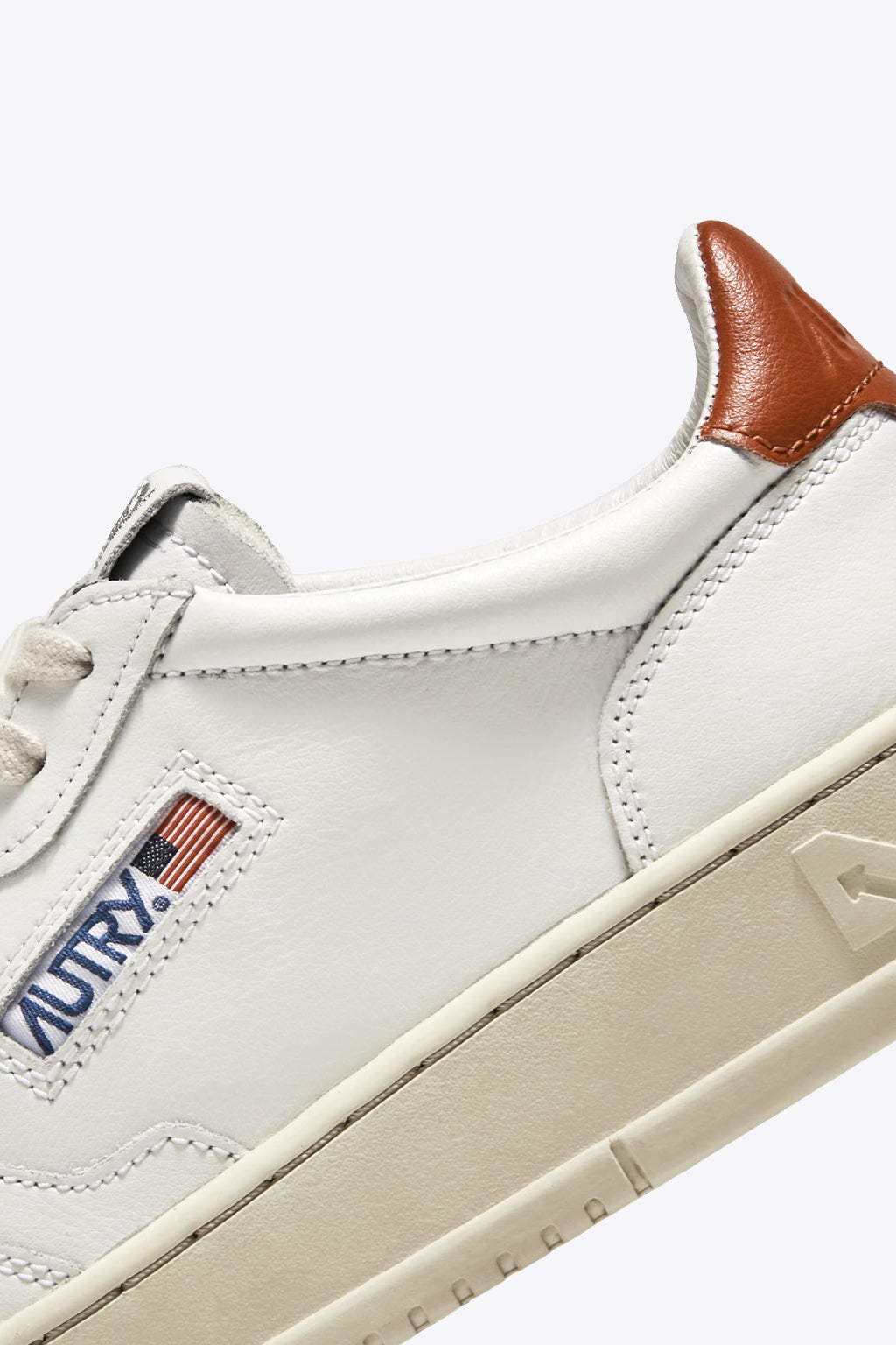 alt-image__White-leather-low-sneaker-with-rust-tab--Medalist