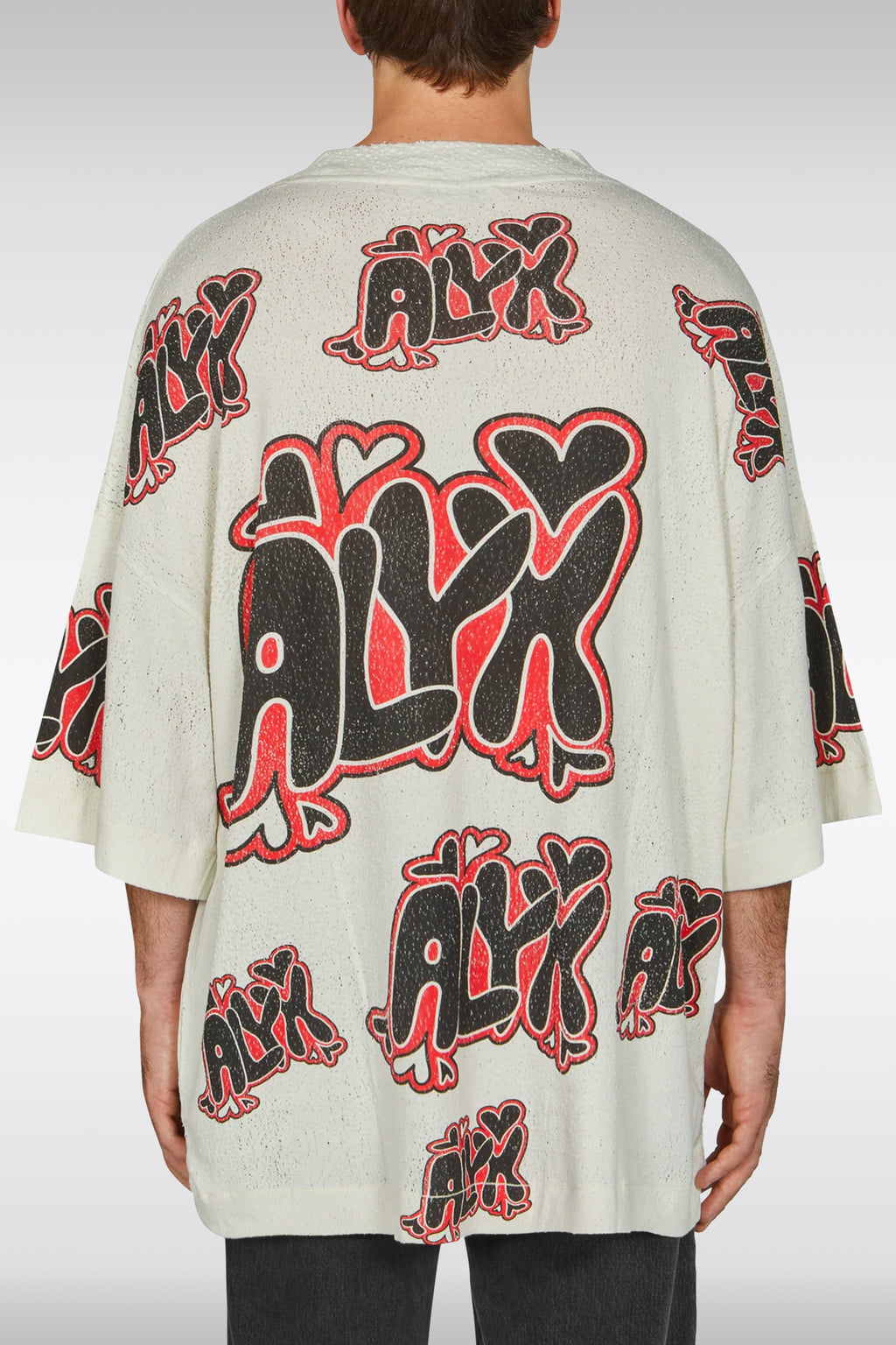 alt-image__T-shirt-in-jersey-panna-con-rotture-e-logo-all-over---Oversize-Needle-Punch-Graphic-Tee